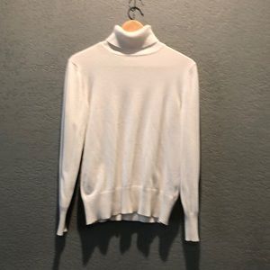 White turtleneck sweater